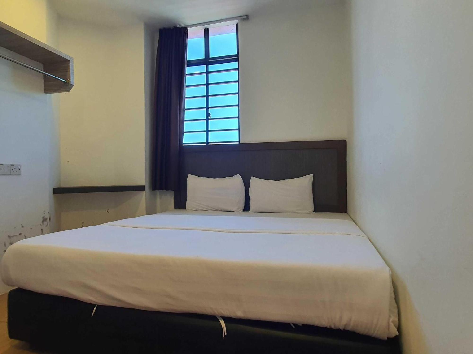 Oyo 91053 Signature Inn Miri Esterno foto