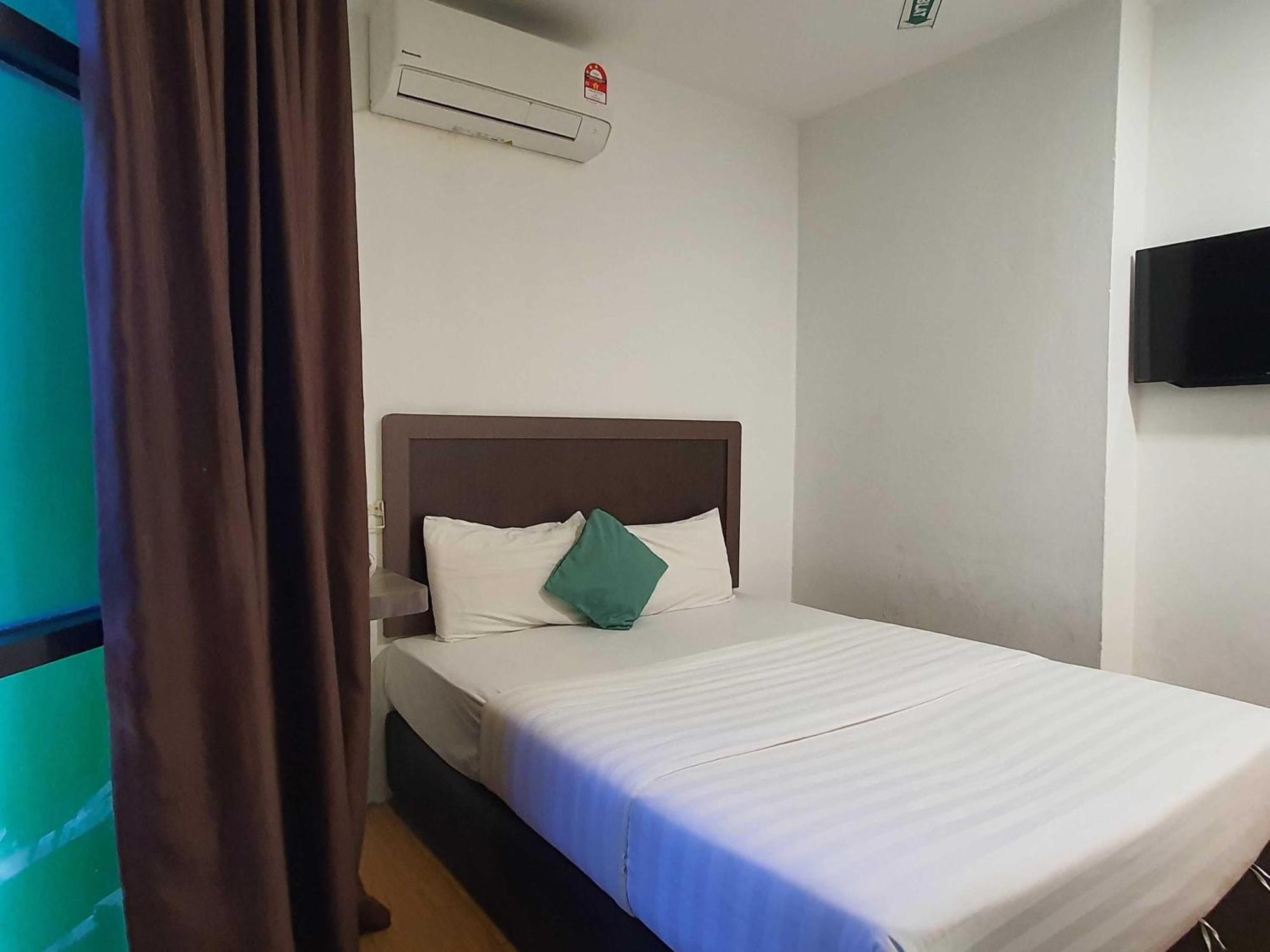 Oyo 91053 Signature Inn Miri Esterno foto