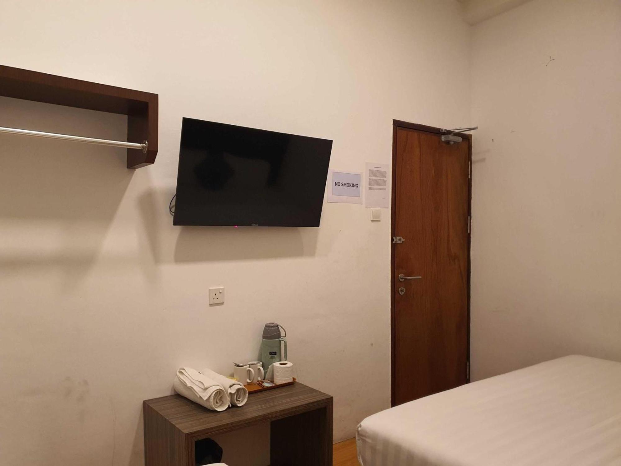 Oyo 91053 Signature Inn Miri Esterno foto