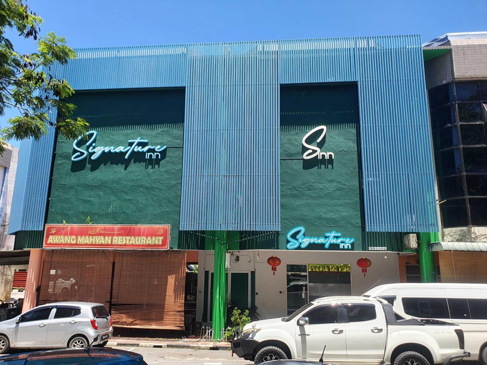 Oyo 91053 Signature Inn Miri Esterno foto